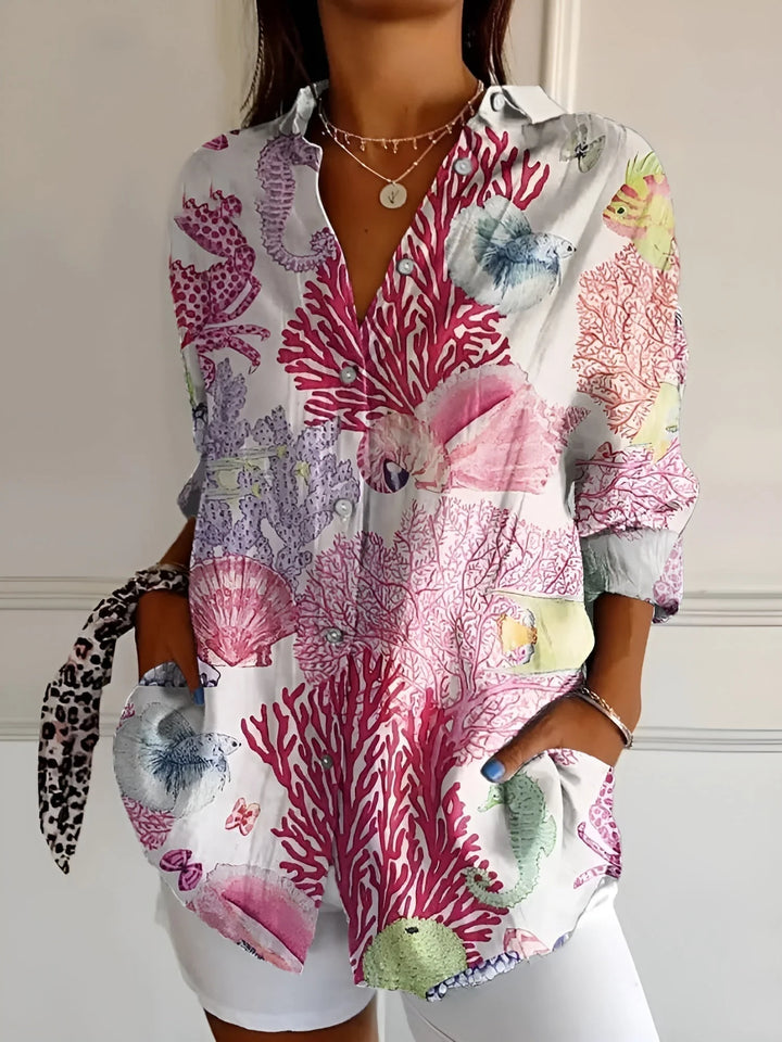 Rosa Damen Button-Down-Hemd mit Langarm, Blumenmuster, ideal für Frühlingstage, Baumwollmaterial, marineblaue Muster.
