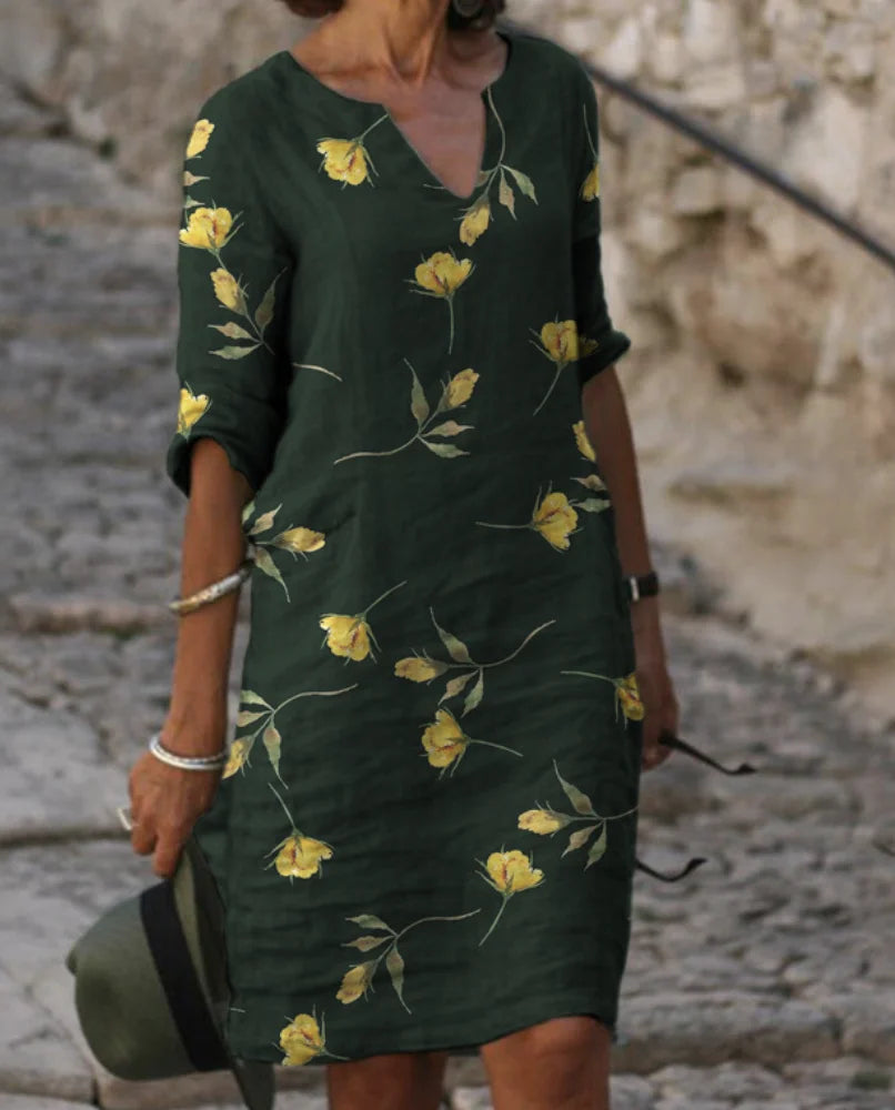 Dunkelgrünes Damen Freizeitkleid mit Blumenmuster, 3/4-Ärmeln, aus leichtem und bequemem Stoff, perfekt für den Alltag.