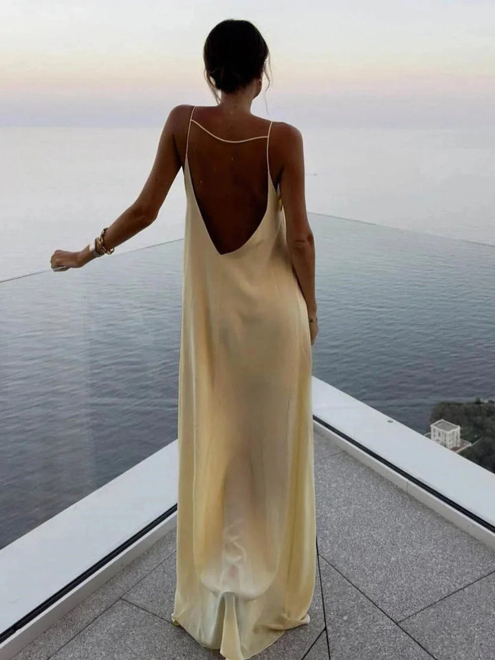 Damen Gelbes Maxikleid mit schmalen Trägern und offenem Rücken – High-quality product image.