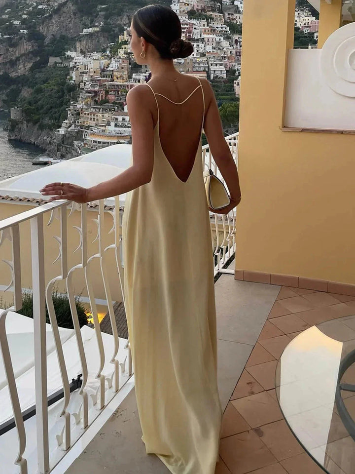 Damen Gelbes Maxikleid mit schmalen Trägern und offenem Rücken – High-quality product image.