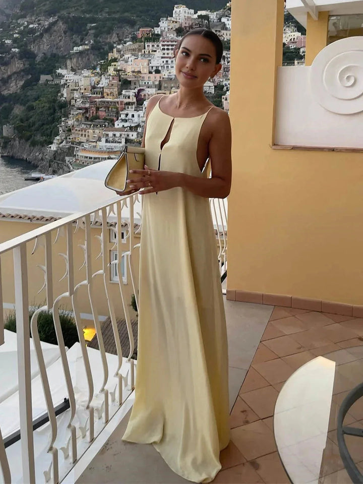 Damen Gelbes Maxikleid mit schmalen Trägern und offenem Rücken – High-quality product image.
