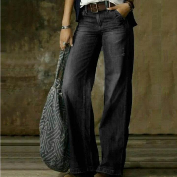 Schwarze Damen Jeans mit hoher Taille, weitem Bein, aus bequemen Denim für einen lässigen Look.