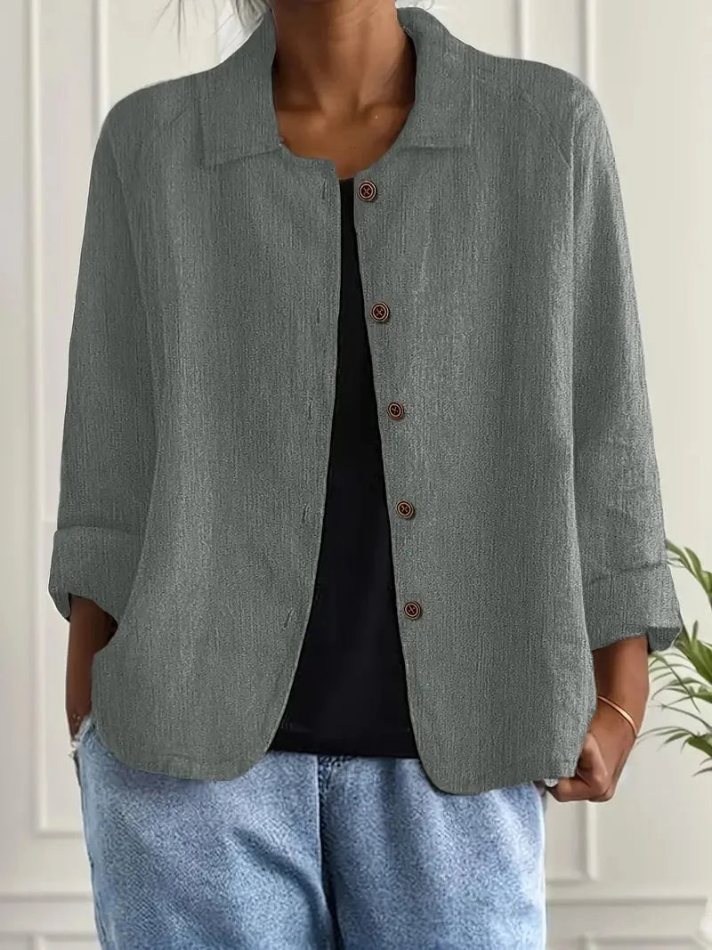 Grau Damenbluse aus leichter Baumwolle mit Knopfleiste und klassischem Schnitt für komfortable Alltagstrageeigenschaften.