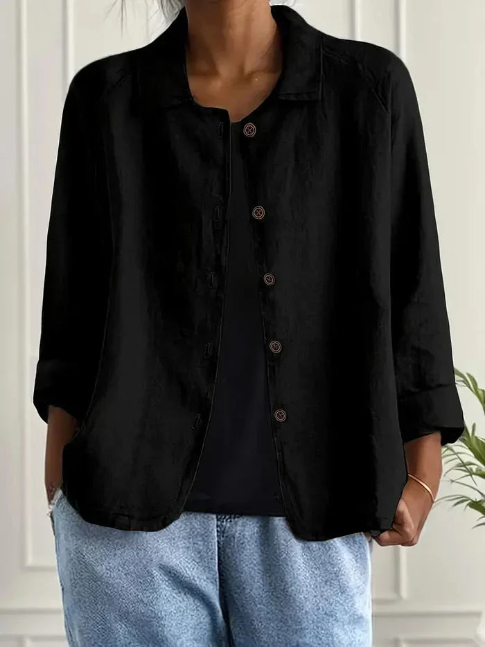 Schwarze Damenbluse aus leichtem Baumwollmix, mit klassischer Knopfleiste und elegantem Schnitt für vielseitige Anlässe.