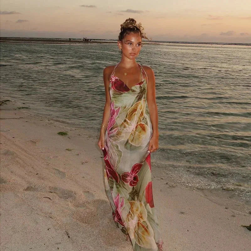 Damen Kleid mit Blumendesign und ärmellosem Schnitt – High-quality product image.