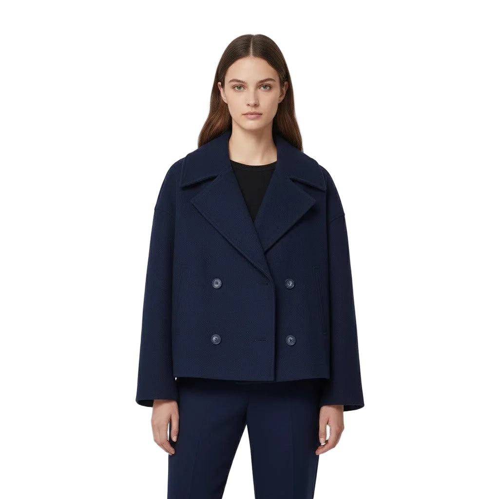 Damen Kurzmantel in Marineblau mit doppelter Knopfleiste, weitem Kragen und robustem, warmem Material für kühle Tage.
