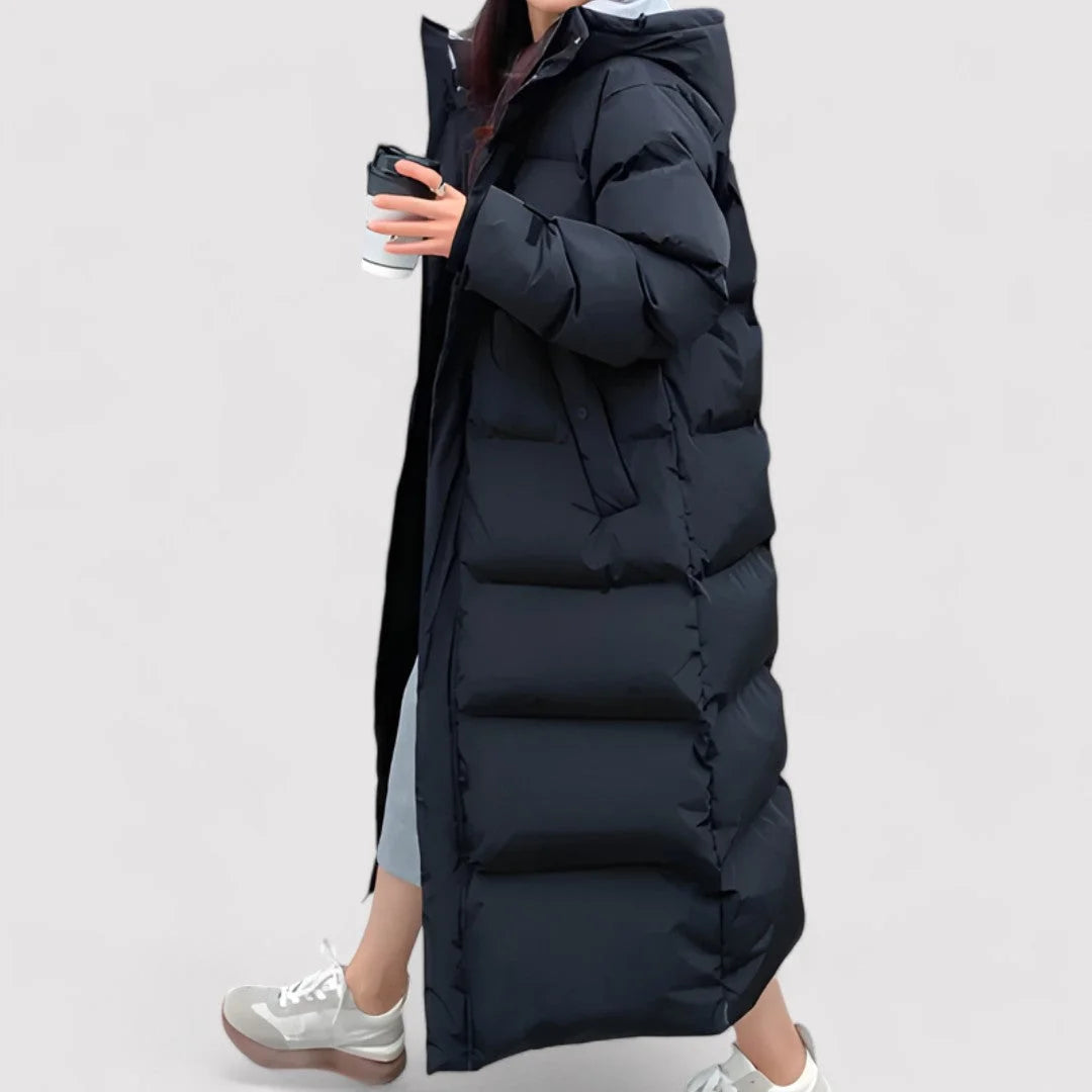 Damen lang geschnittener wattierter Mantel mit Kapuze aus warmem Polyester, ideal für kalte Tage und lässige Anlässe.