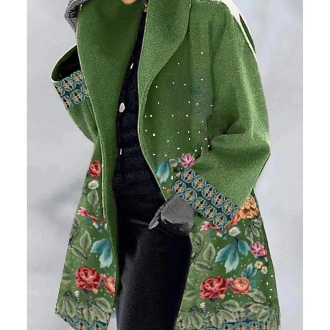 Damen Langmantel mit floralem Muster in Blaue Blätter, aus leichtem Stoff, weite Kragen und bequemer Schnitt.
