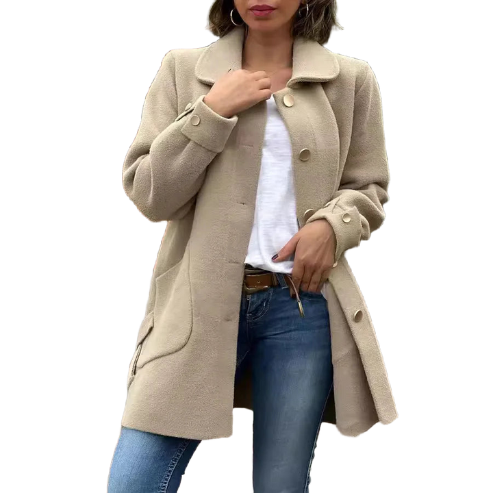 Beige Damen Oversize-Mantel aus weichem Material mit Knopfleiste und klassischem Kragen, ideal für kalte Tage.
