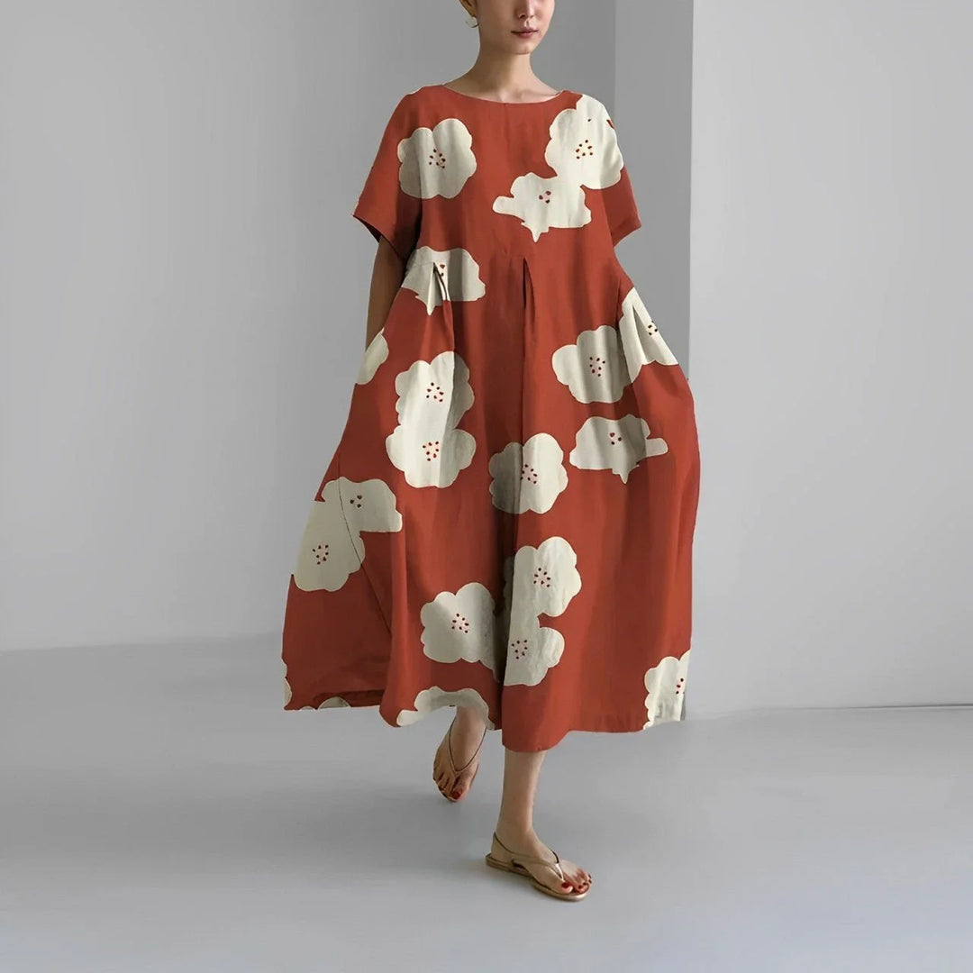 Damen Maxi-Kleid in Rostrot mit Blumenprint und Rundhalsausschnitt: Leichtes Material, blumiges Muster, perfekt für…