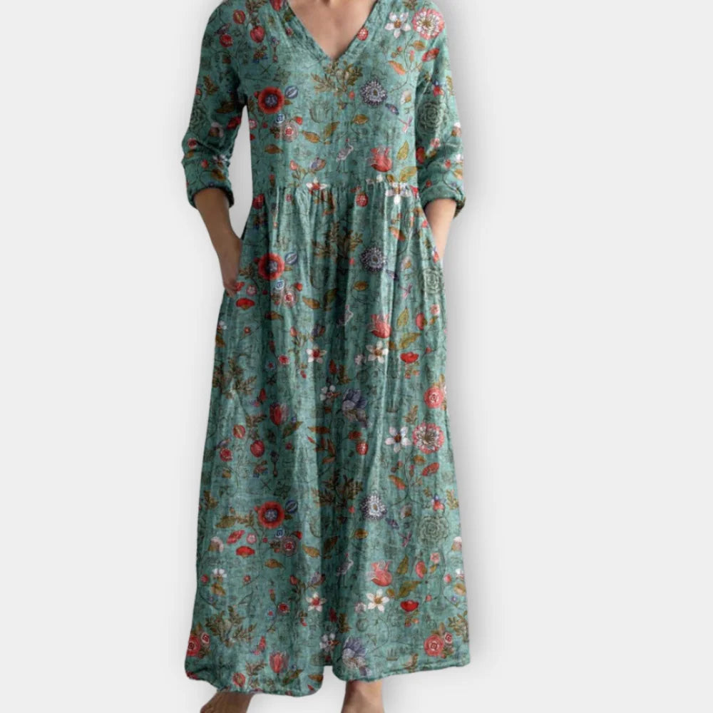 Grünes Damen Maxikleid mit V-Ausschnitt, floral gemustert, aus leichtem Stoff, perfekt für den Sommer.
