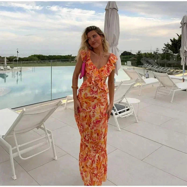 Damen Maxikleid mit V-Ausschnitt und floralem Rüschensaum – High-quality product image.