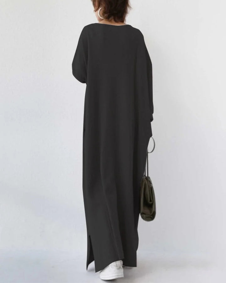 Damen Maxikleid aus weichem Stoff, mit V-Ausschnitt und langen Ärmeln, ideal für entspannte Tage oder besondere Anlässe.