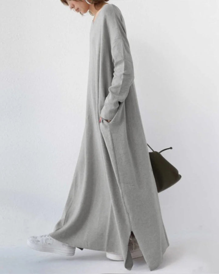 Damen Maxikleid aus leichtem Stoff, V-Ausschnitt, lange Ärmel und fließender Schnitt für bequemen Tragekomfort.