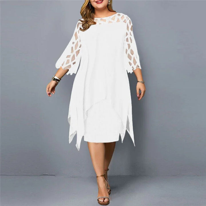 Weißes Damen Midi-Kleid in Übergröße mit asymmetrischem Saum, aus leichtem Stoff, luftig und bequem für jeden Anlass.
