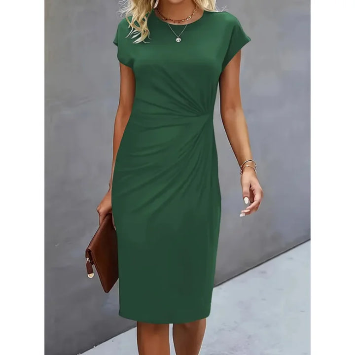 Damen Midi-Kleid in Dunkelgrün, Kurzarm mit geknoteten Details. Aus weichem Stoff, figurbetonte Passform für schicke…