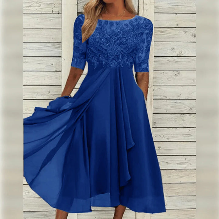 Schwarzes Midi-Kleid mit Spitzenoberteil, asymmetrischem Saum und V-Ausschnitt für Frauen, ideal für festliche Anlässe.
