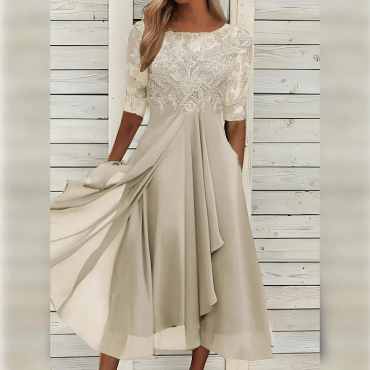 Beiges Damen Midi-Kleid aus Spitze mit asymmetrischem Saum, elegant und feminin - perfekt für besondere Anlässe.