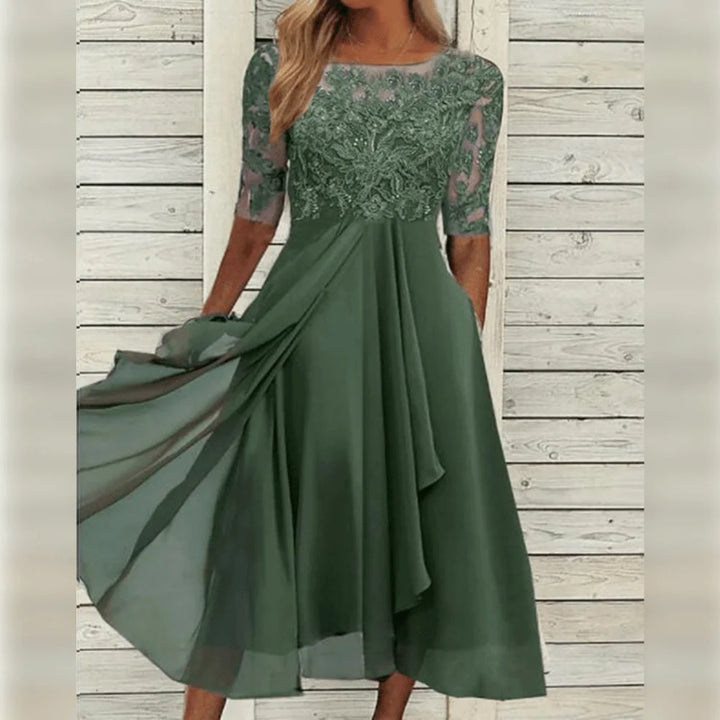 Grünes Damen Midi-Kleid mit Spitzenoberteil und asymmetrischem Saum - elegantes Design in einer erfrischenden Farbe, perfekt…