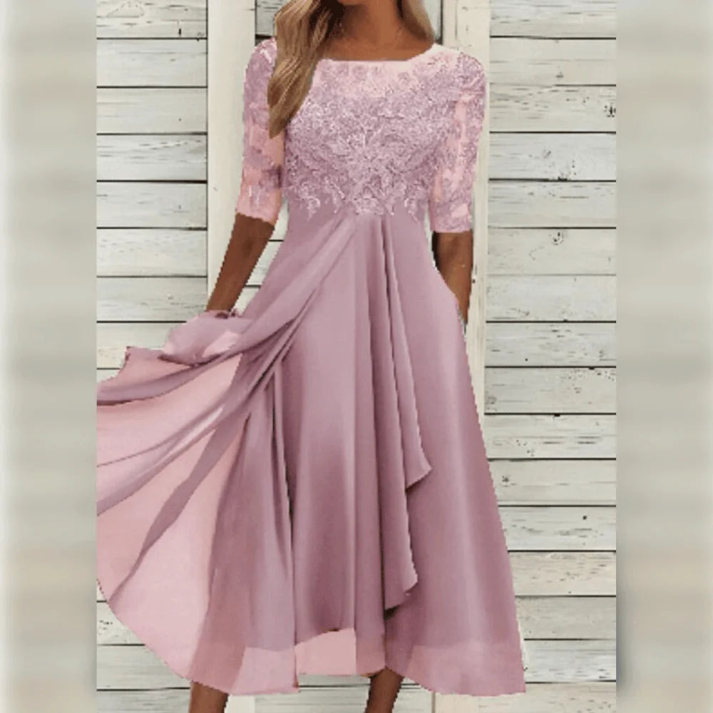 Rosa Damen Midi-Kleid mit Spitzenoberteil und asymmetrischem Saum, ideal für festliche Anlässe, elegant und feminin.