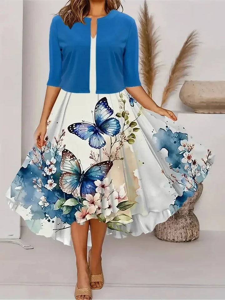 Damen Midi-Sommerkleid in Blau mit Blazer, Blumenmuster und Taillengürtel, ideal für den Sommer, aus leichtem Stoff.