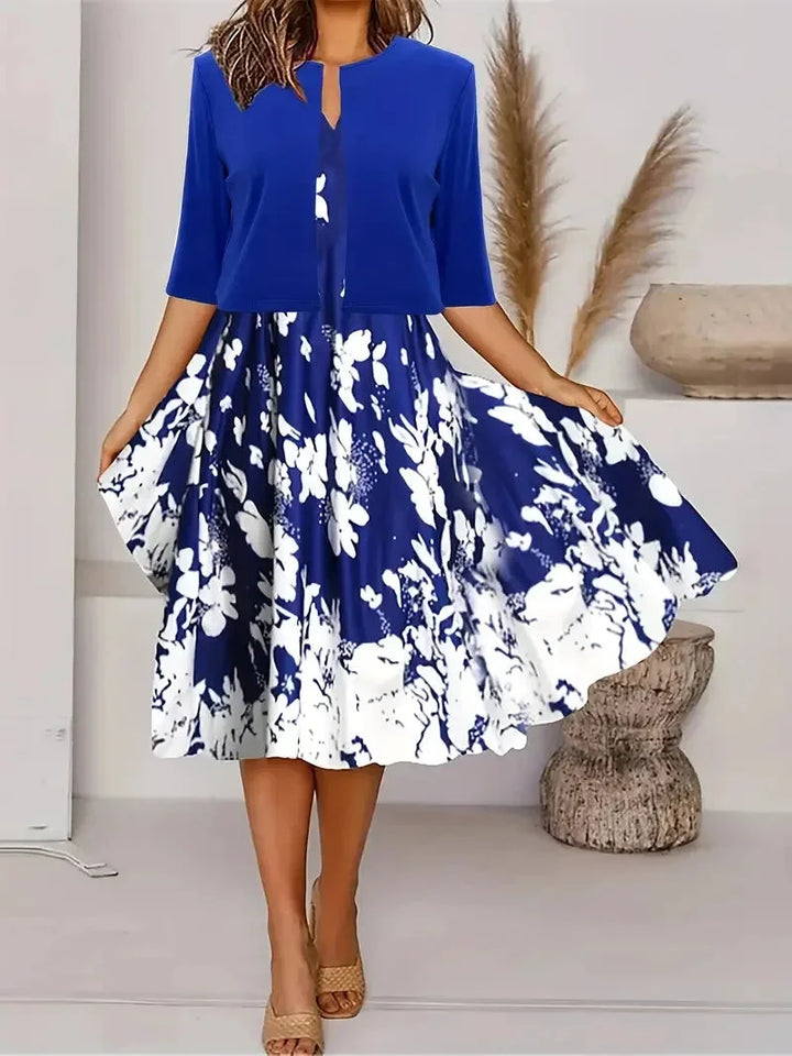 Damen Midi-Sommerkleid in Dunkelblau mit Blazer und Blumenmuster, aus leichtem Stoff, perfekt für sommerliche Tage im Garten…