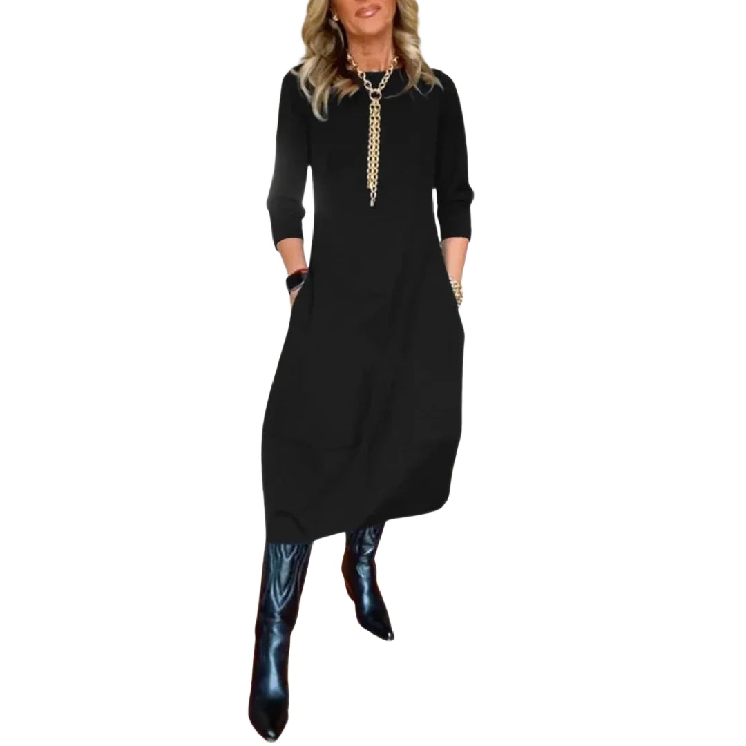 Schwarzes Damen Midikleid mit Dreiviertelärmeln und Taschen aus leichtem, atmungsaktivem Stoff für täglichen Komfort.