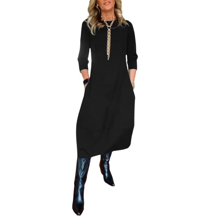 Schwarzes Damen Midikleid mit Dreiviertelärmeln und Taschen aus leichtem, atmungsaktivem Stoff für täglichen Komfort.