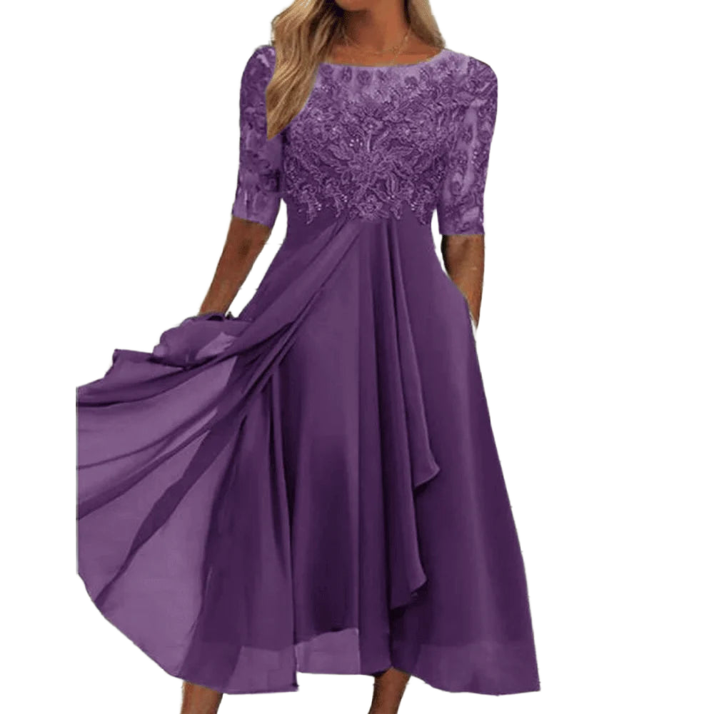 Schwarzes Damen Midi-Kleid mit Spitzenoberteil und asymmetrischem Saum aus leichtem Stoff.