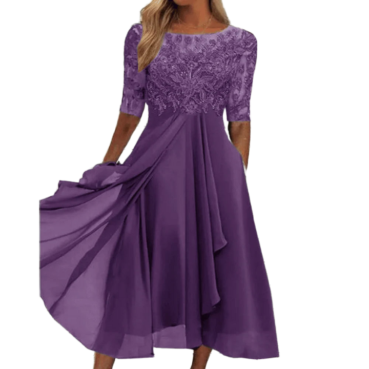 Schwarzes Damen Midi-Kleid mit Spitzenoberteil und asymmetrischem Saum aus leichtem Stoff.
