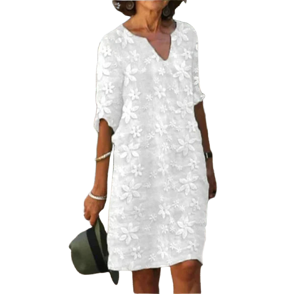Weißes Damen A-Linien Kleid mit Blumenmuster, V-Ausschnitt. Aus zartem Stoff gefertigt, ideal für sommerliche Anlässe.