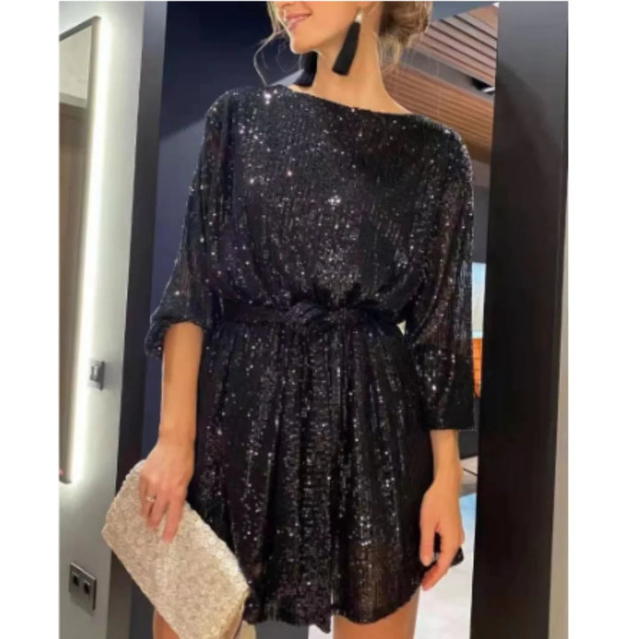 Schwarzes Damen Minikleid mit Glitzer-Effekt und Ballonärmeln, tailliert geschnitten, perfekt für festliche Anlässe oder den…