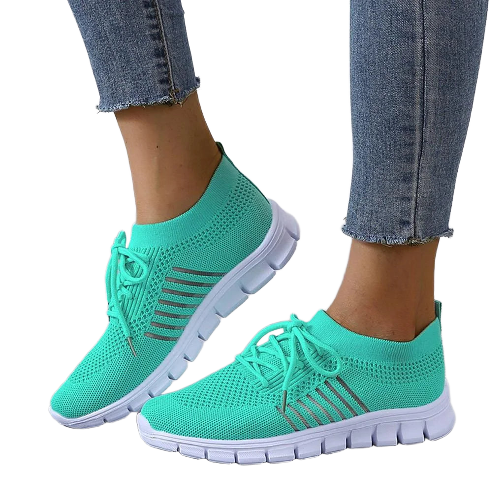 Graue Orthopädische Damen-Sneakers mit atmungsaktivem Netzgewebe für Komfort und Stil unterwegs.