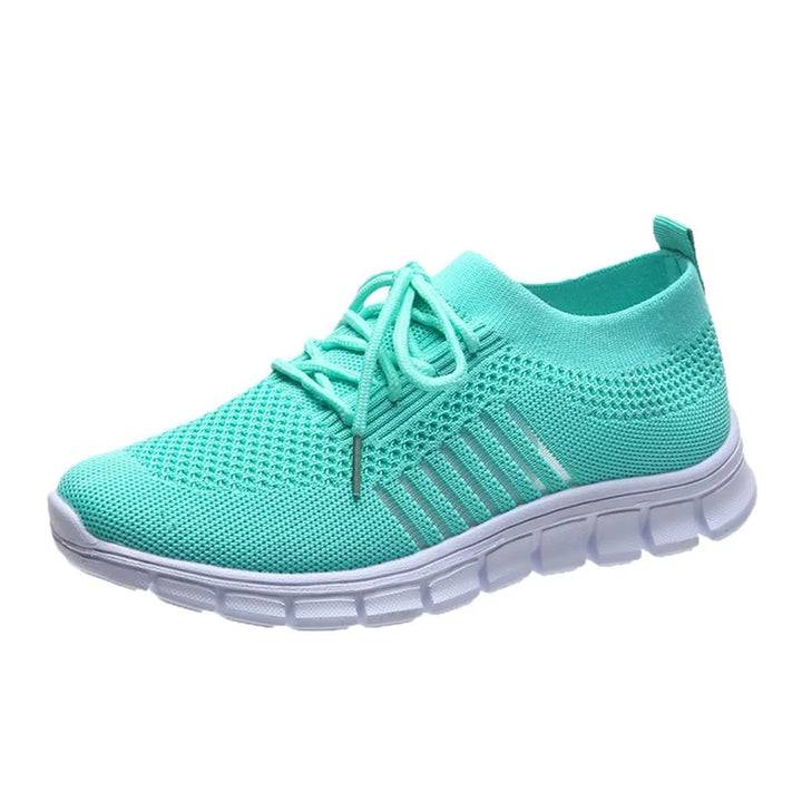 Orthopädische Damen-Sneakers mit atmungsaktivem Netzmaterial in Grau, bequem und funktional für den täglichen Gebrauch.
