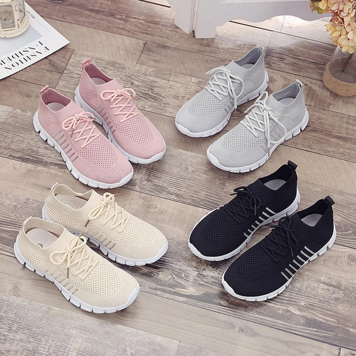 Orthopädische Damen-Sneakers aus atmungsaktivem Netz für maximalen Komfort und Unterstützung beim Gehen und Stehen.