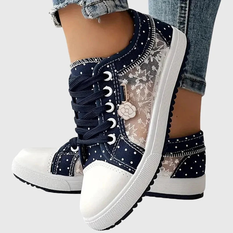 Damen Orthopädische Sneakers aus atmungsaktivem Mesh mit Blumendetail und rutschfester Sohle für täglichen Komfort.