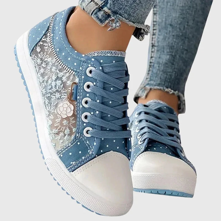 Damen orthopädische Sneakers aus atmungsaktivem Mesh mit Blumendetails und rutschfester Sohle für optimalen Komfort.