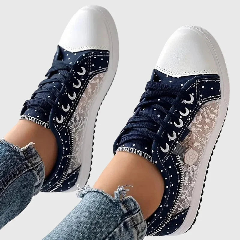 Damen Orthopädische Sneakers aus weichem Material mit buntem Blumendetail und rutschfester Sohle für hohen Komfort.