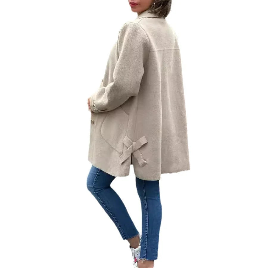 Damen Oversize-Mantel aus warmem Wollgemisch, mit Knopfleiste und klassischem Kragen für einen lässigen Look.