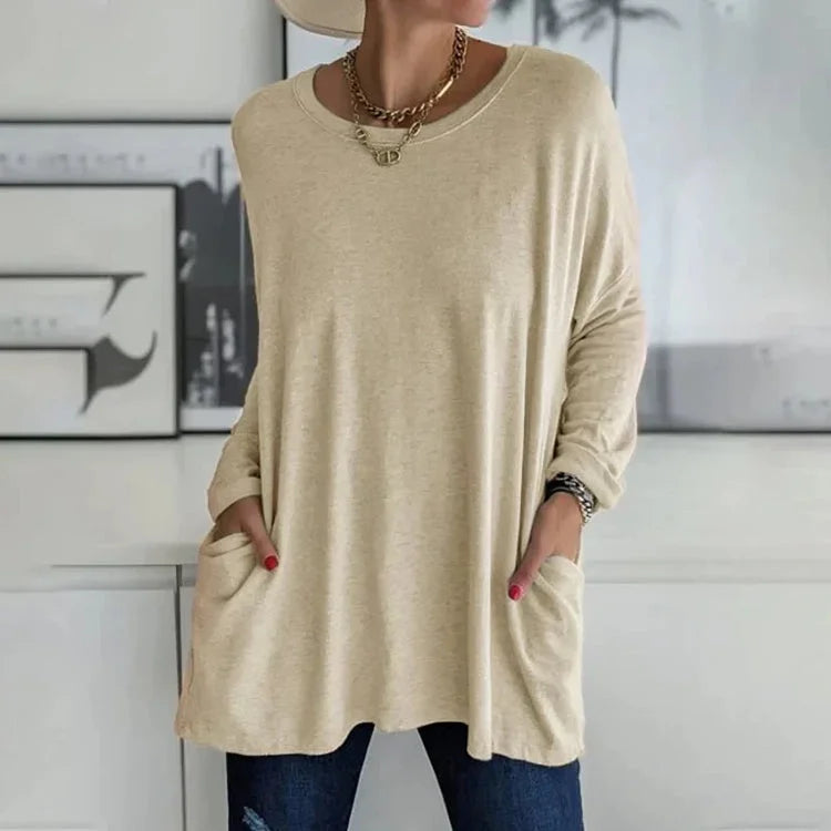 Damen Oversize Pullover in Khaki, aus weichem Baumwollmix mit Rundhalsausschnitt und praktischen Taschen.