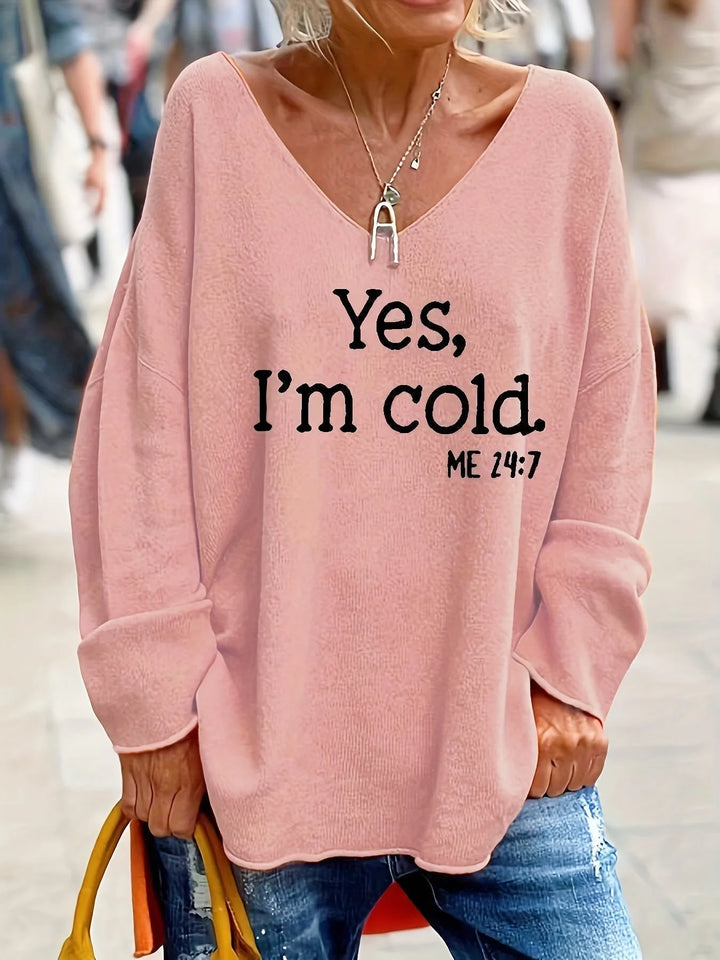Damen Oversize Pullover in Rosa, V-Ausschnitt, bequeme Passform und auffälliger Statement-Print aus weichem Baumwollmix.