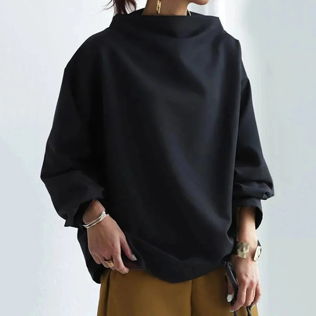 Schwarzer Oversize Rollkragenpullover für Damen aus weichem Strick, ideal für lässige Tage und vielseitige Outfits.