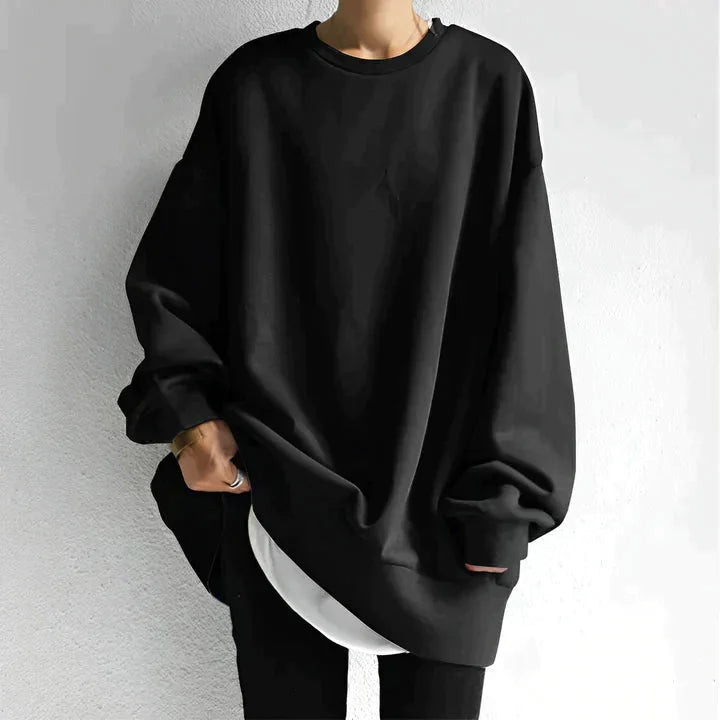Schwarzes Damen Oversize Sweatshirt aus weichem Baumwollmix mit Rundhalsausschnitt und langen Ärmeln, lässiger Schnitt.