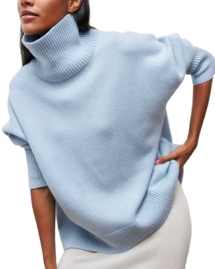 Hellblauer Damen Rollkragenpullover aus weichem Baumwollmix mit entspannter Passform und langen Ärmeln.