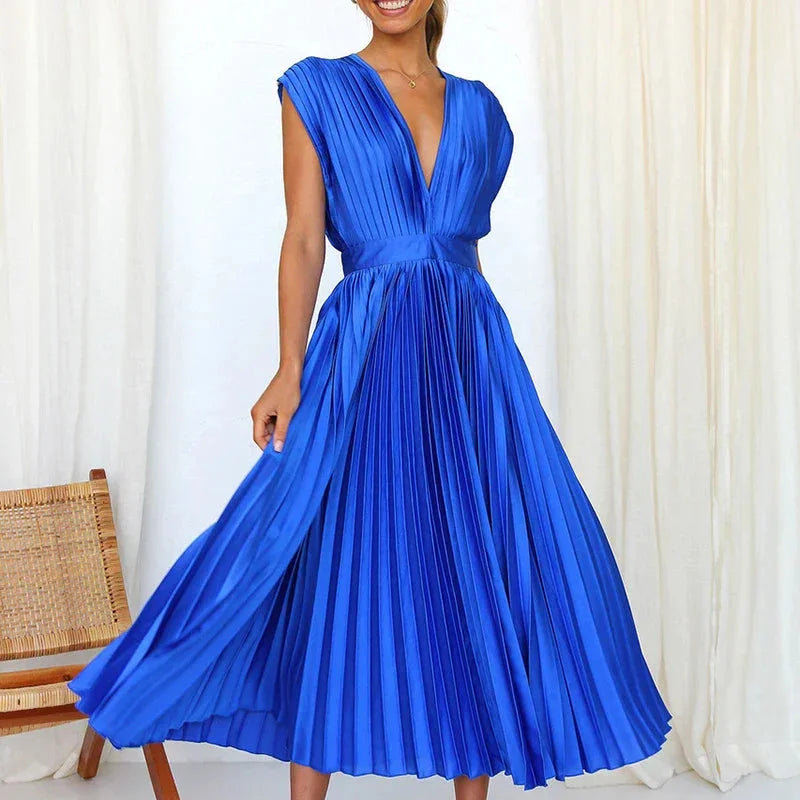 Damen Plissee Midi-Kleid mit V-Ausschnitt aus leichtem Stoff in Faltenoptik, perfekt für lässigen, schicken Look.