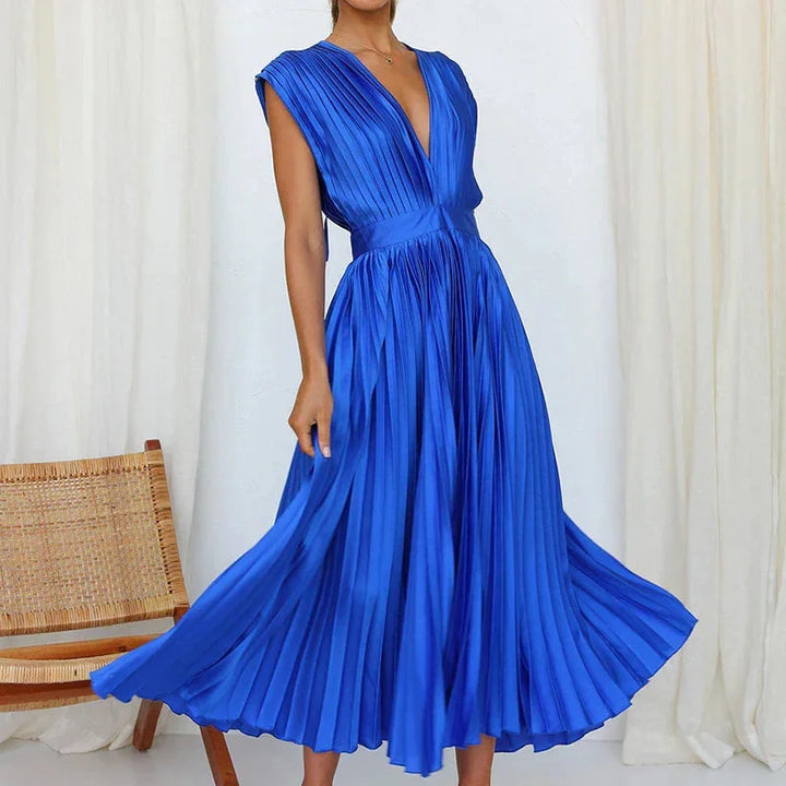 Damen Plissee Midi-Kleid mit V-Ausschnitt aus luftigem Stoff in sommerlichem Design - perfekt für den Alltag oder besondere…