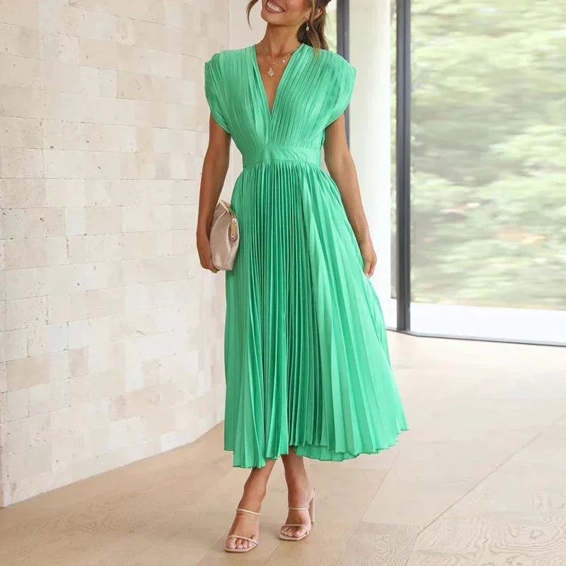 Grünes Damen Plissee Midi-Kleid mit V-Ausschnitt, bequemer Stoff, elegantes Design, Alltag oder besondere Anlässe.