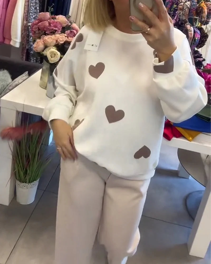 Damen Pullover aus Baumwollmix mit Herzmuster, ideal für lässige Anlässe und gemütliche Tage.