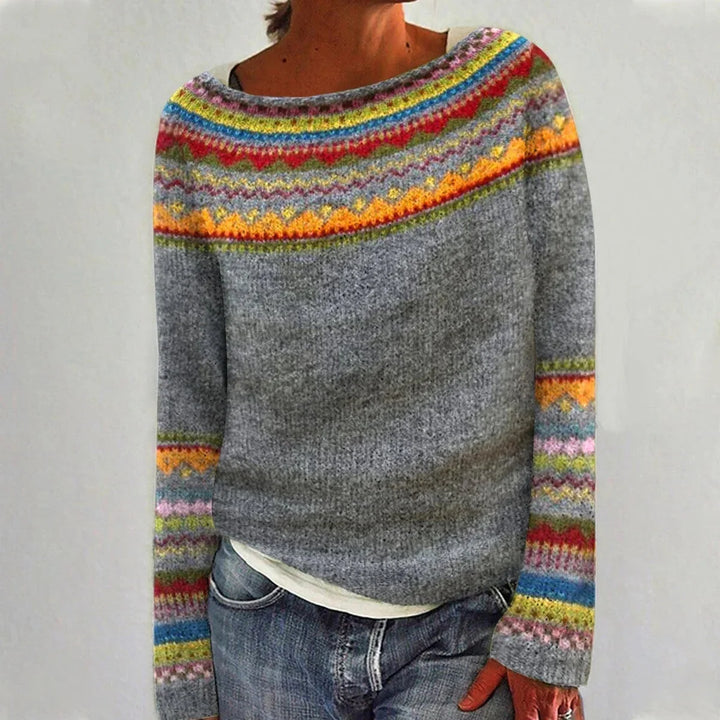 Grau Damen Pullover mit buntem Norwegermuster, Rundhalsausschnitt, aus weichem, warmem Material für kalte Tage.