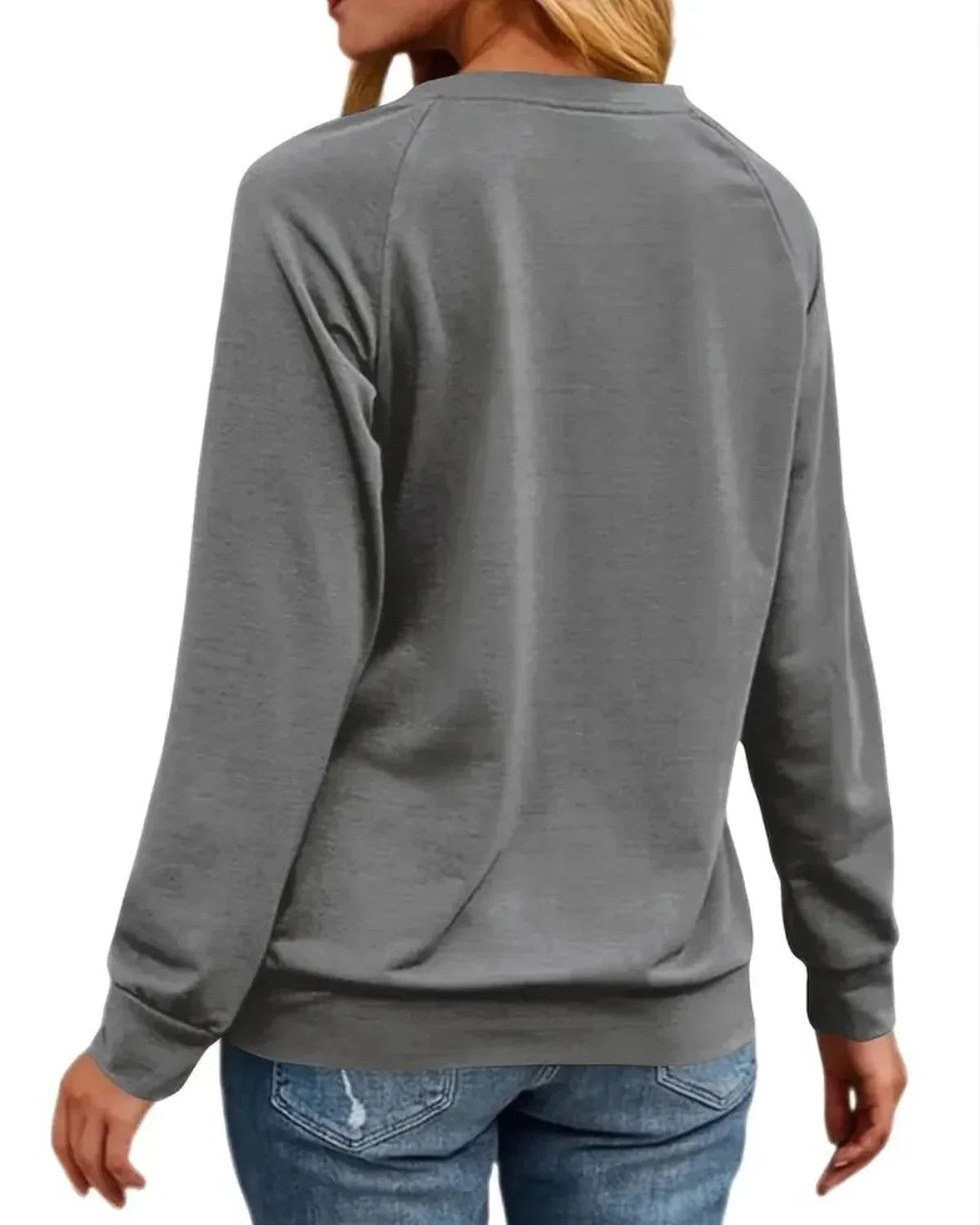 Damen Pullover aus weichem Baumwollmix mit buntem Weihnachtsmotiv und Rundhalsausschnitt, ideal für die Festtage.